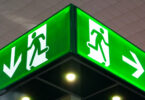 Emergency exit sign, cube light on ceiling.