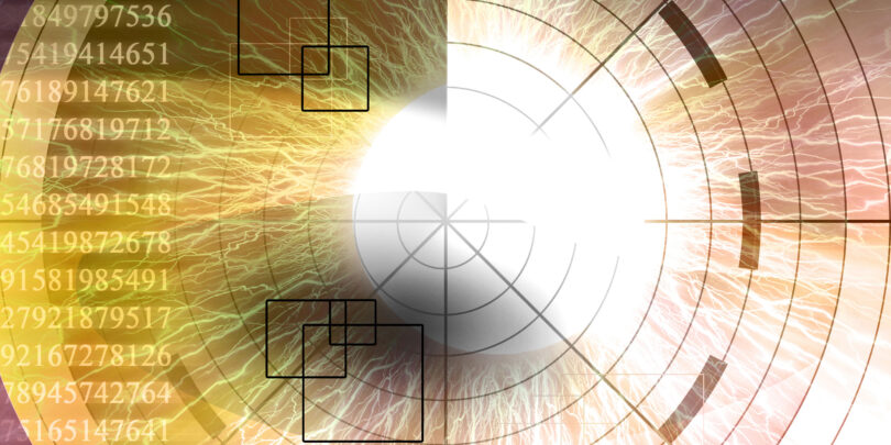 Eye being scanned on a dark purple background.