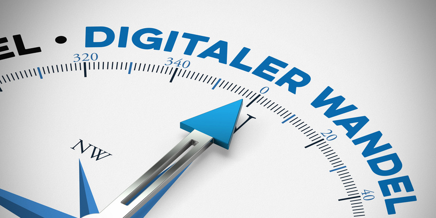 Kompassnadel, die auf das Syntagma "Digitaler Wandel" zeigt.