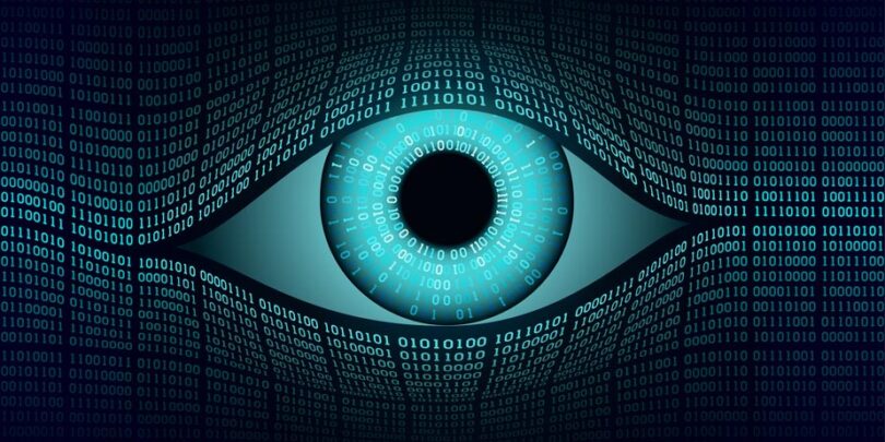 Zahlenmatrix aus Nullen und Einsen, aus deren Mitte ein Auge hervorblickt.