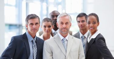 Portrait of a confident proud business group standing together.