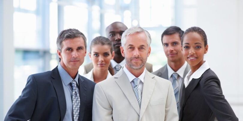 Portrait of a confident proud business group standing together.