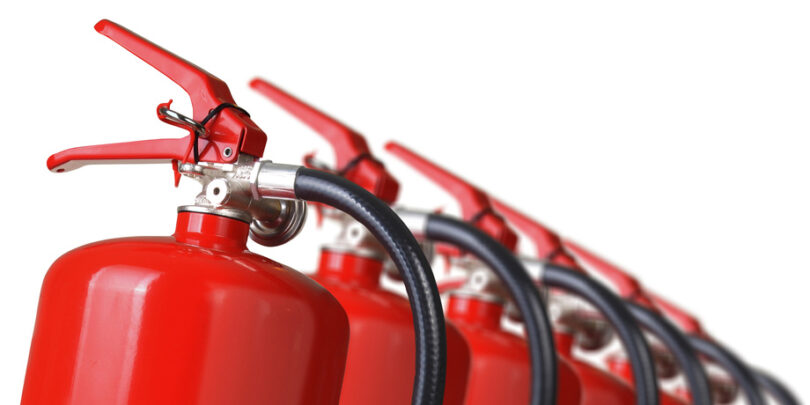 fire extinguishers close up isolated on white background.